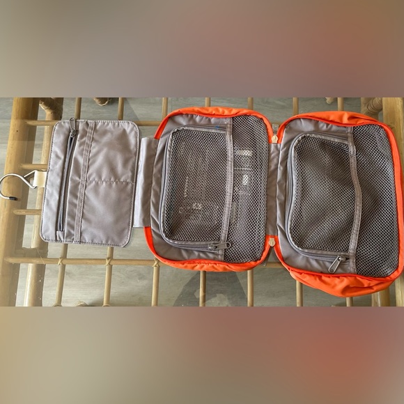 Orange toiletry bag w/ hanger. - Picture 3 of 3